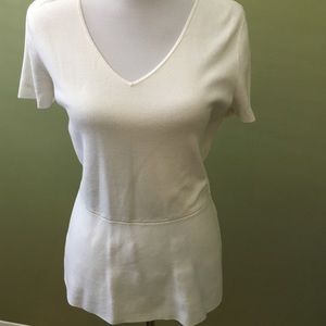 Ann Taylor white peplum knit sweater.